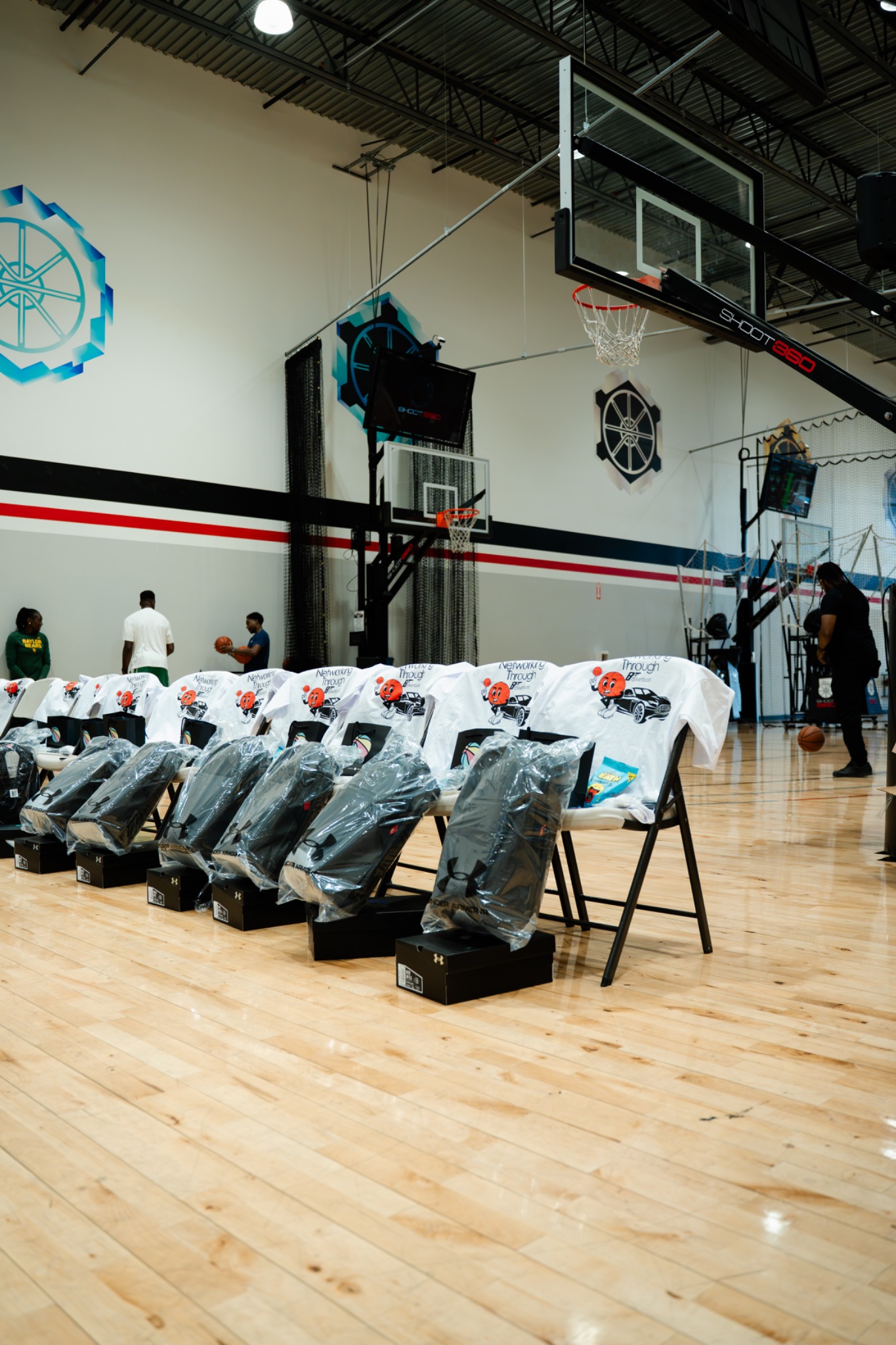 B2B BALL event gifting prepared beside the court